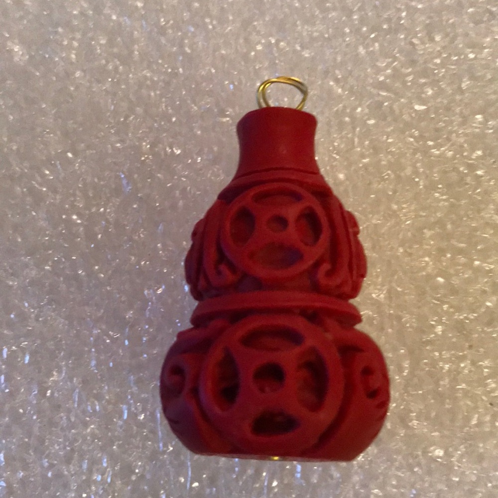 Vintage engraved cinnabar pendent